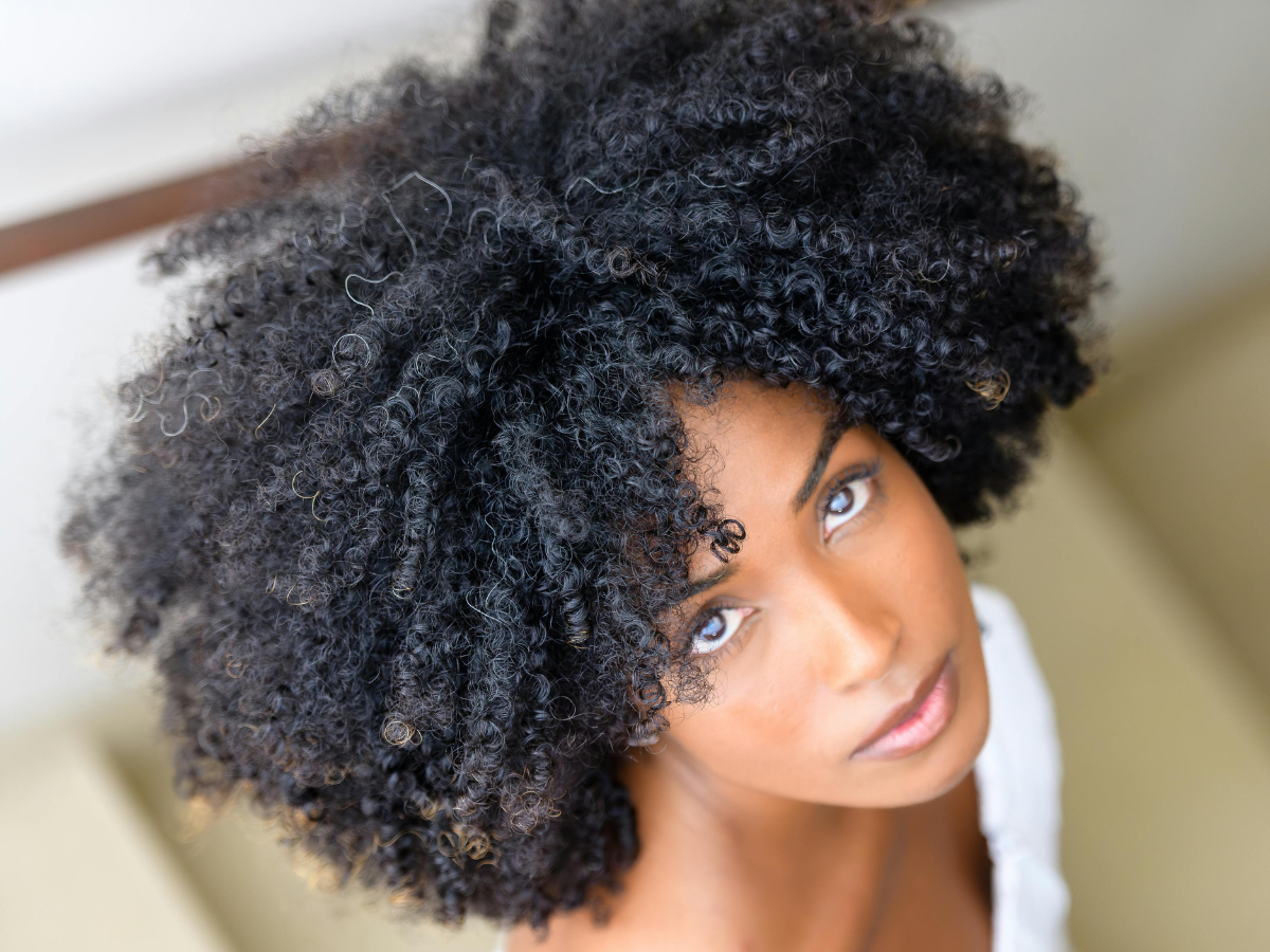Beautiful woman with defined natural curly hair